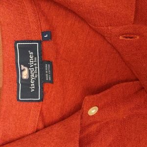 Vineyard Vines like mg sleeve polo .Rusty red color.